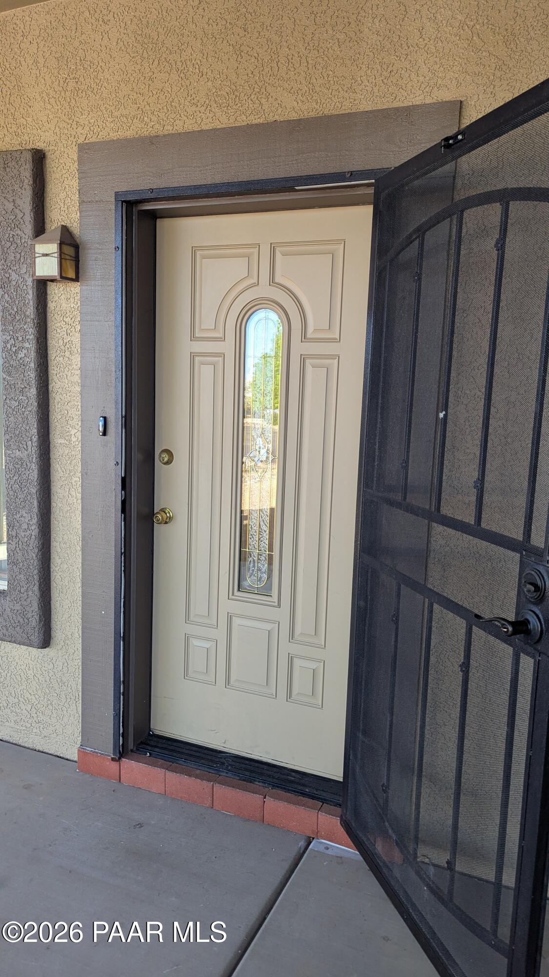 3416 North Victor Road, Unit 1 Prescott Valley, AZ 86314 - Photo 3 of 27 a view of front door with wooden floor