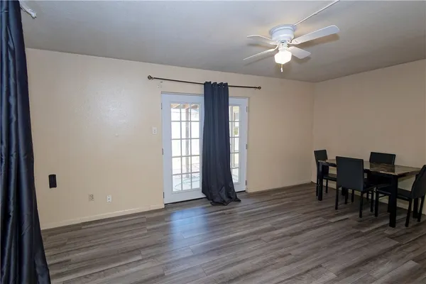 a view of a livingroom with furniture and chandelier