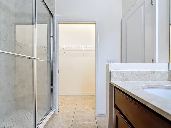 a bathroom with a toilet and a sink