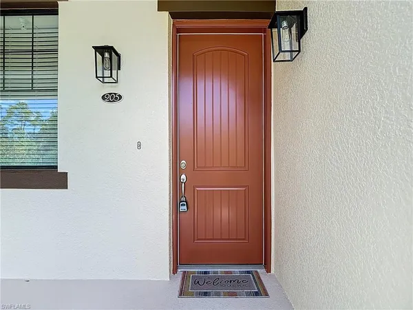 a view of a kitchen with a sink and dishwasher cabinets