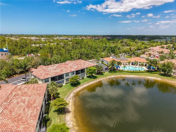 a view of a lake with a yard