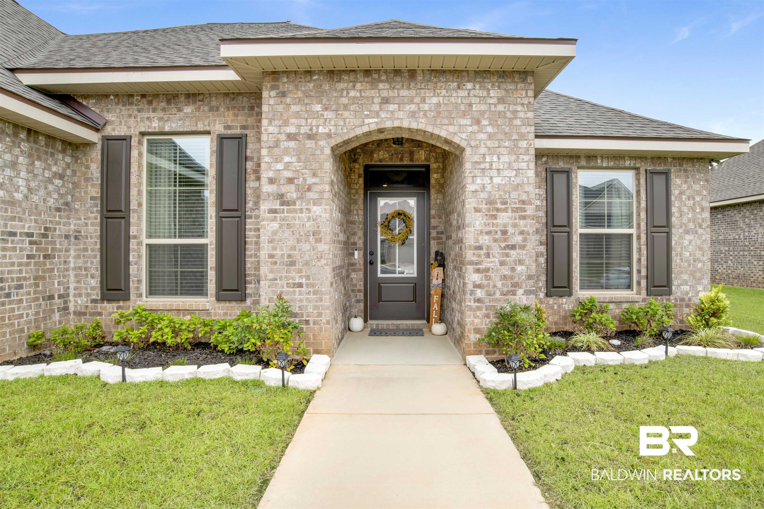 30770 Marcel Boulevard Spanish Fort, AL 36527 - Photo 2 of 23 Doorway to property featuring a yard