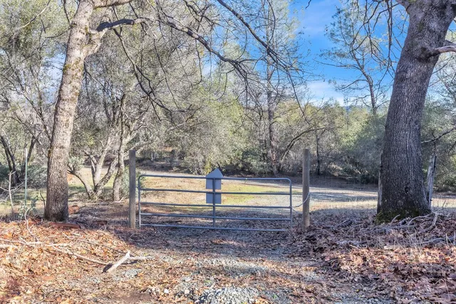 a view of a yard covered with snow