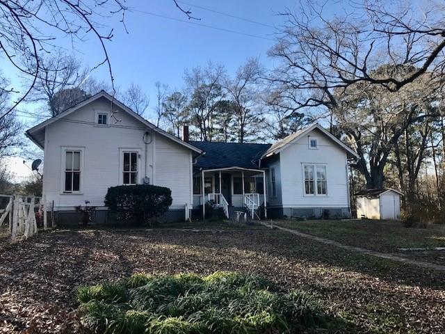 a house that has a lot of plants in it