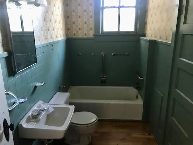 a view of empty room with a windows