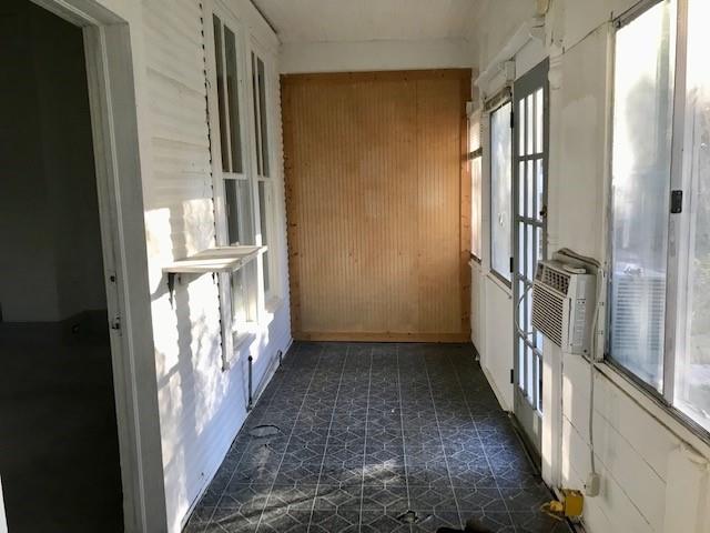 6962 Redbud Lane Ida, LA 71044 - Photo 28 of 40 a view of a hallway with wooden floor and staircase