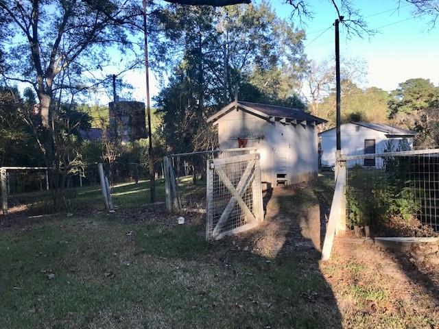 6962 Redbud Lane Ida, LA 71044 - Photo 35 of 40 a house view with a sitting space and garden