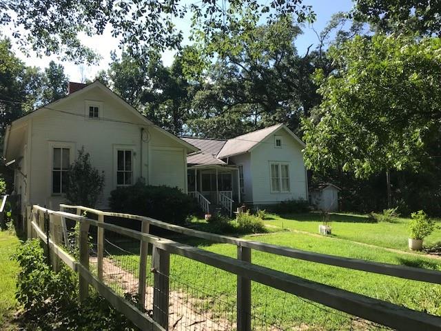 6962 Redbud Lane Ida, LA 71044 - Photo 7 of 40 a front view of a house with yard and green space