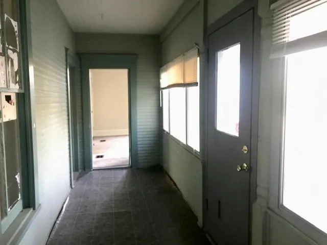 a view of an empty room and window