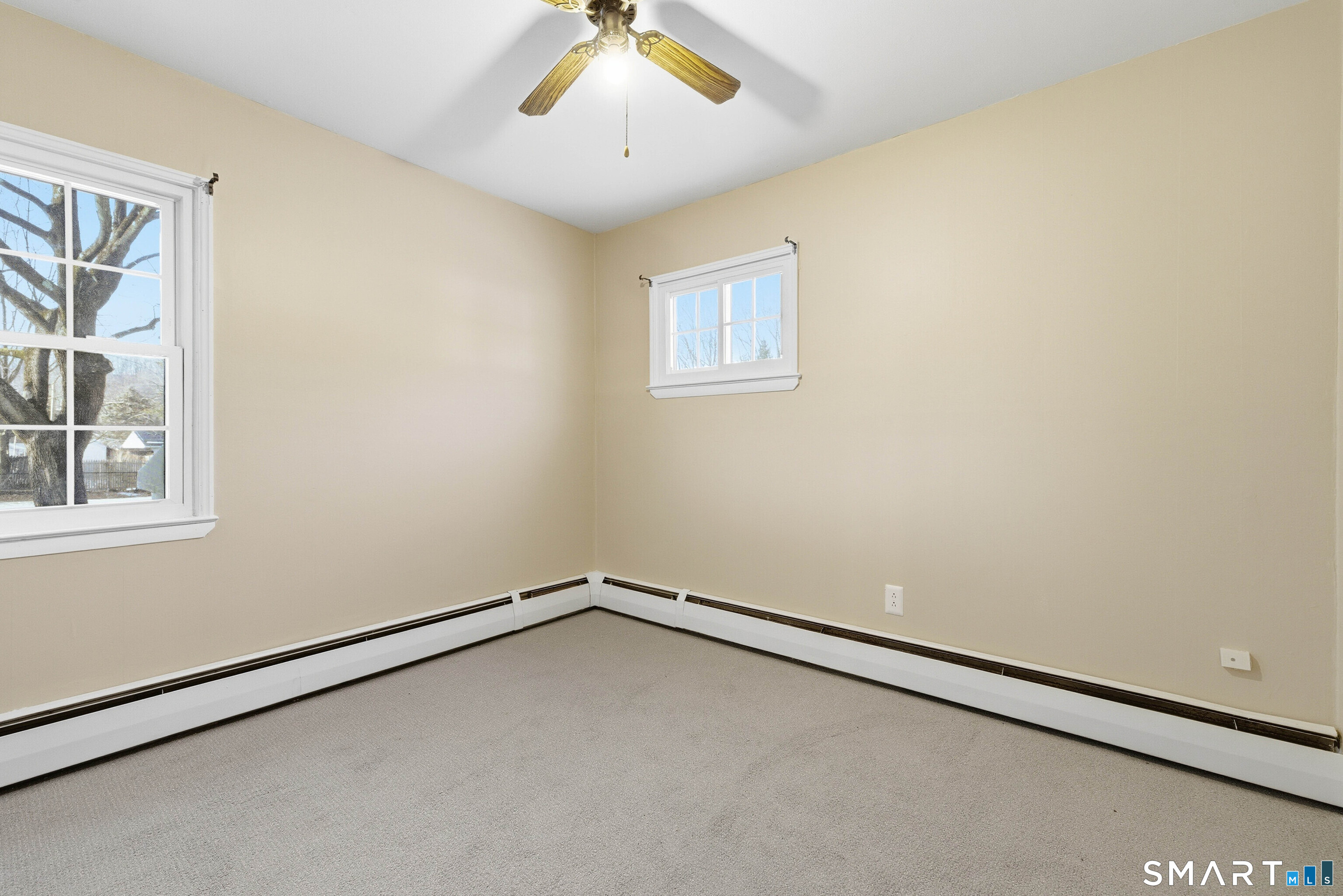57 Hellstrom Road East Haven, CT 06512 - Photo 19 of 36 an empty room with a window