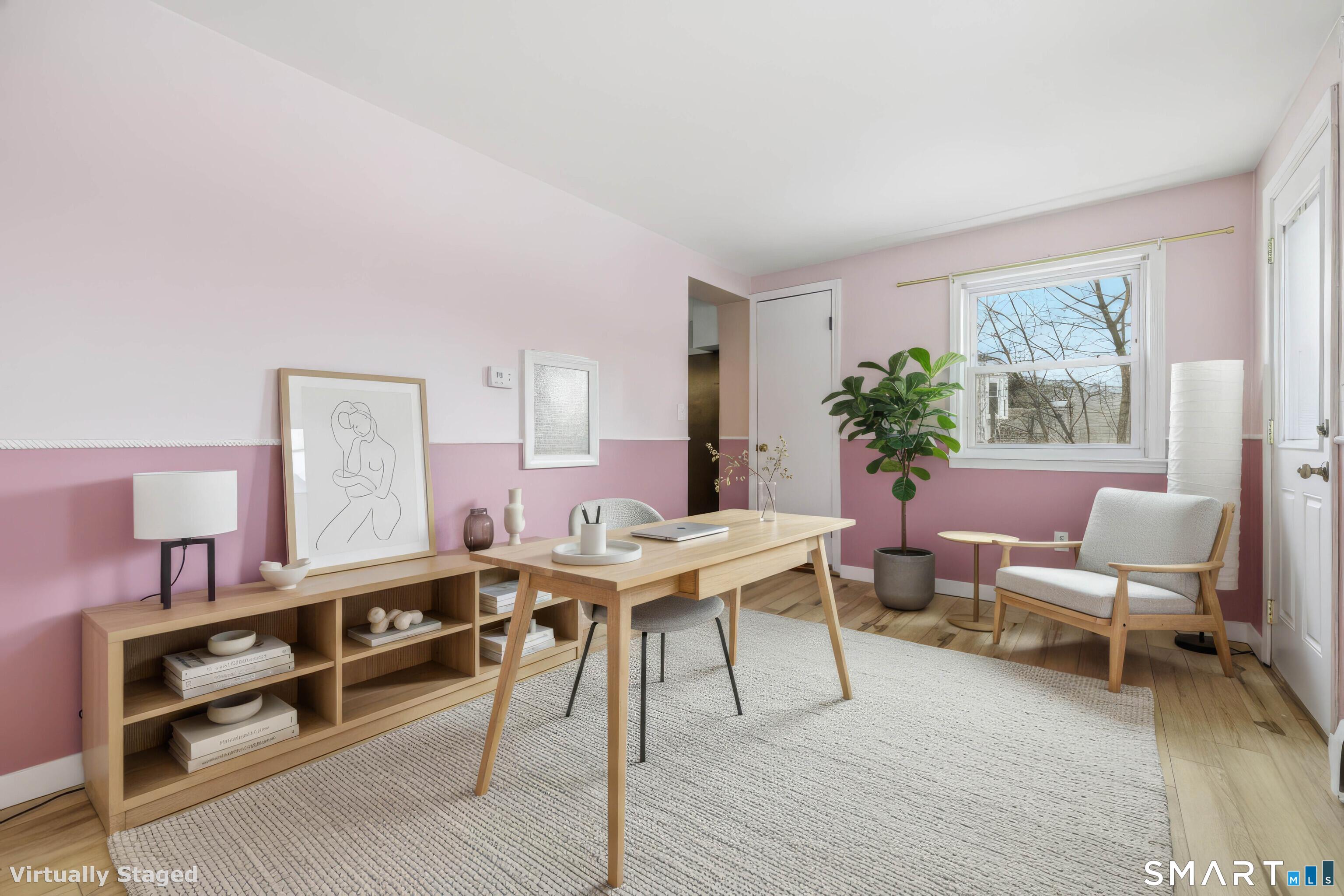 57 Hellstrom Road East Haven, CT 06512 - Photo 24 of 36 a room with furniture wooden floor and window