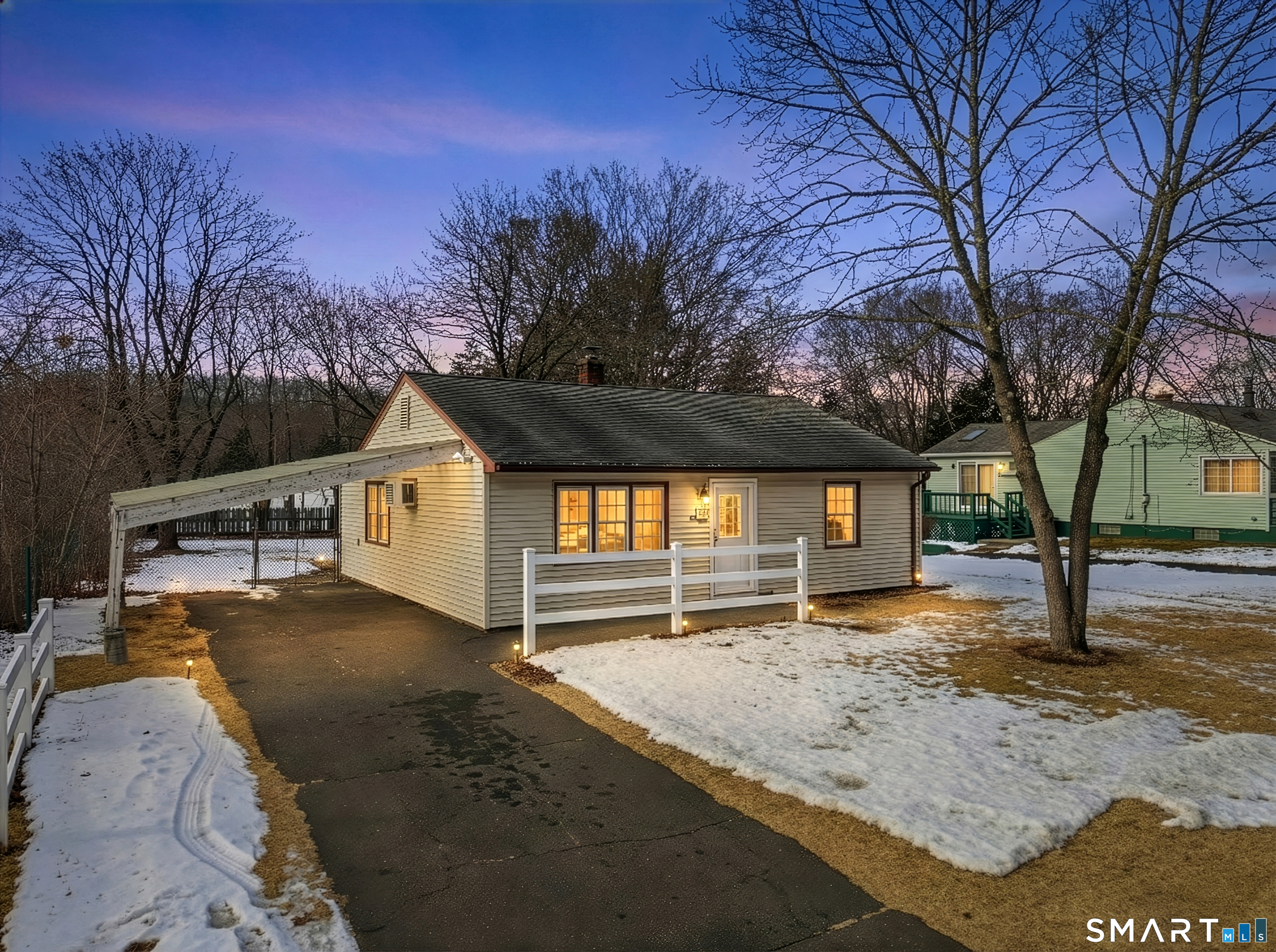 57 Hellstrom Road East Haven, CT 06512 - Photo 36 of 36 a front view of a house with a yard and garage
