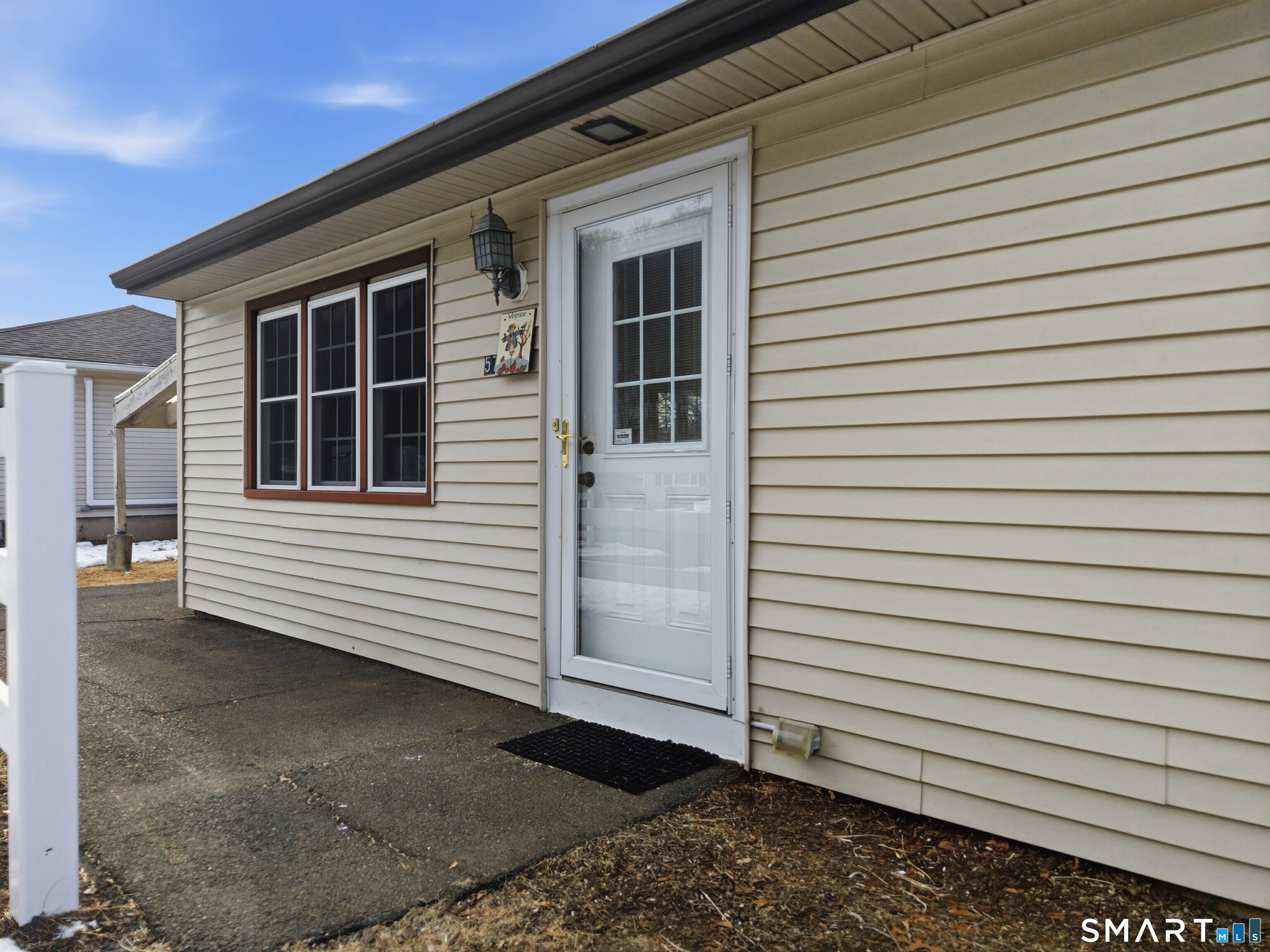 57 Hellstrom Road East Haven, CT 06512 - Photo 4 of 36 a view of a house with white door