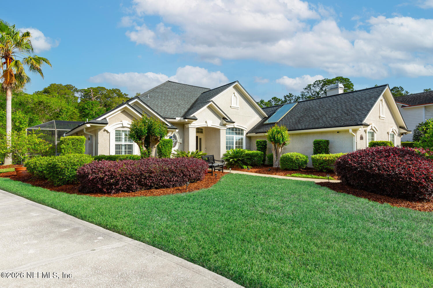 240 Shell Bluff Court Ponte Vedra Beach, FL 32082 - Photo 1 of 53 a front view of a house with a garden