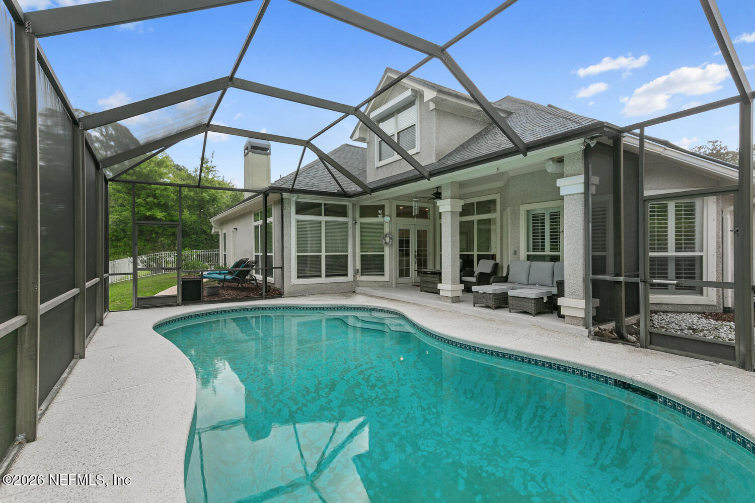 240 Shell Bluff Court Ponte Vedra Beach, FL 32082 - Photo 11 of 53 a view of a house with swimming pool and sitting area