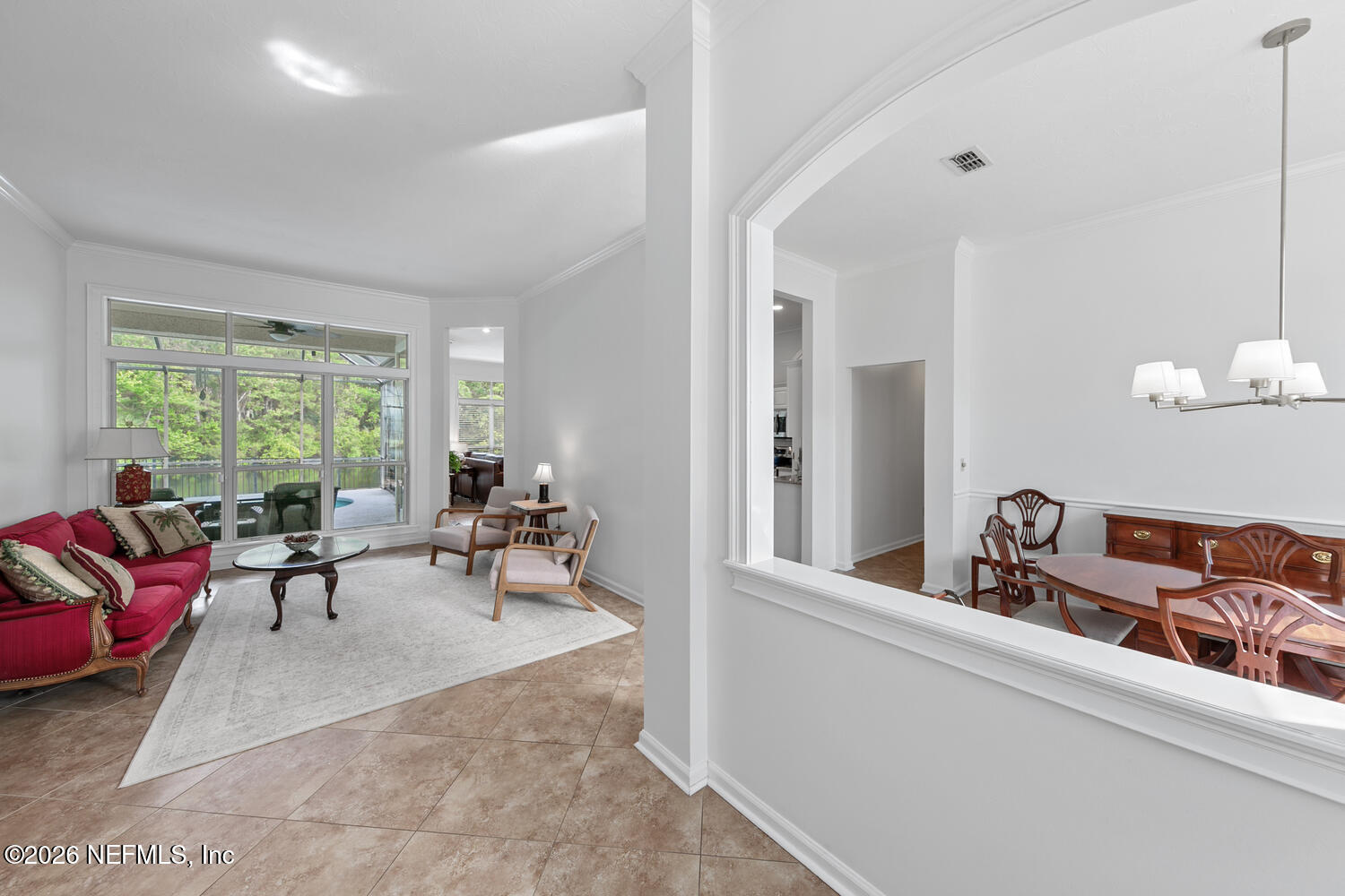 240 Shell Bluff Court Ponte Vedra Beach, FL 32082 - Photo 16 of 53 a living room with furniture and a large window