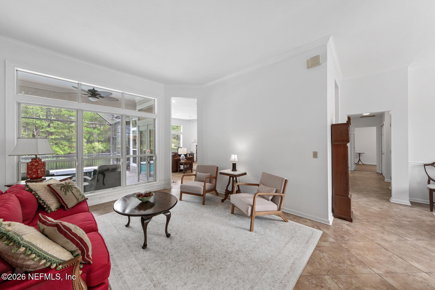 240 Shell Bluff Court Ponte Vedra Beach, FL 32082 - Photo 18 of 53 a living room with furniture and a large window