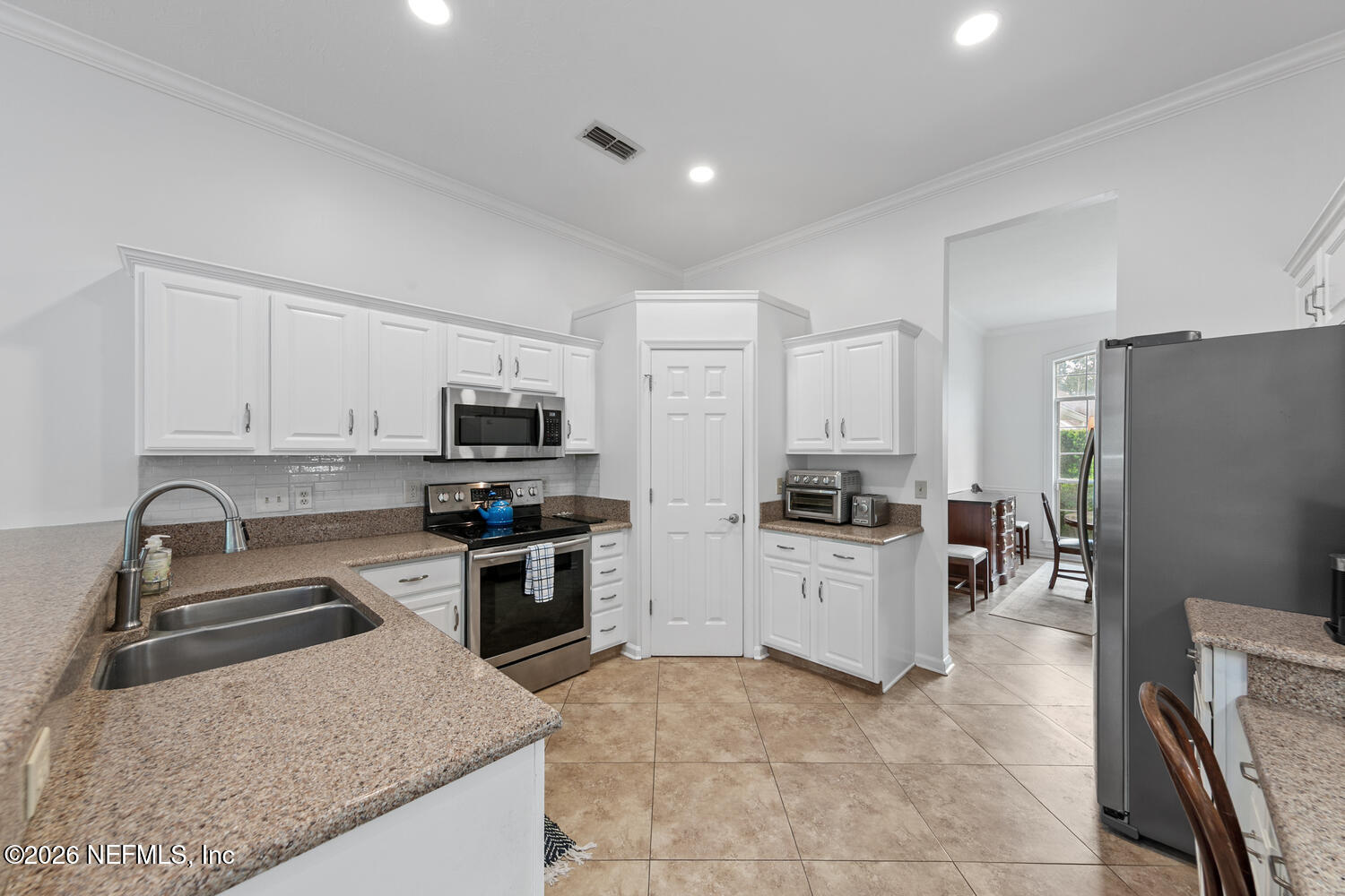 240 Shell Bluff Court Ponte Vedra Beach, FL 32082 - Photo 21 of 53 a kitchen with a sink stove and refrigerator