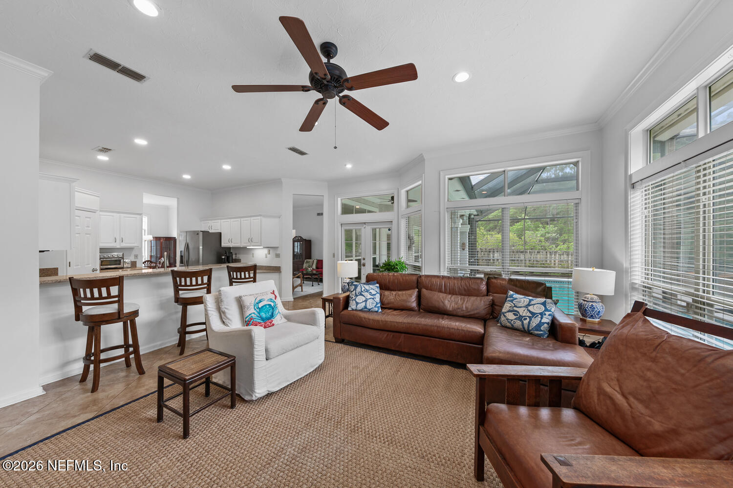 240 Shell Bluff Court Ponte Vedra Beach, FL 32082 - Photo 24 of 53 a living room with furniture and a large window