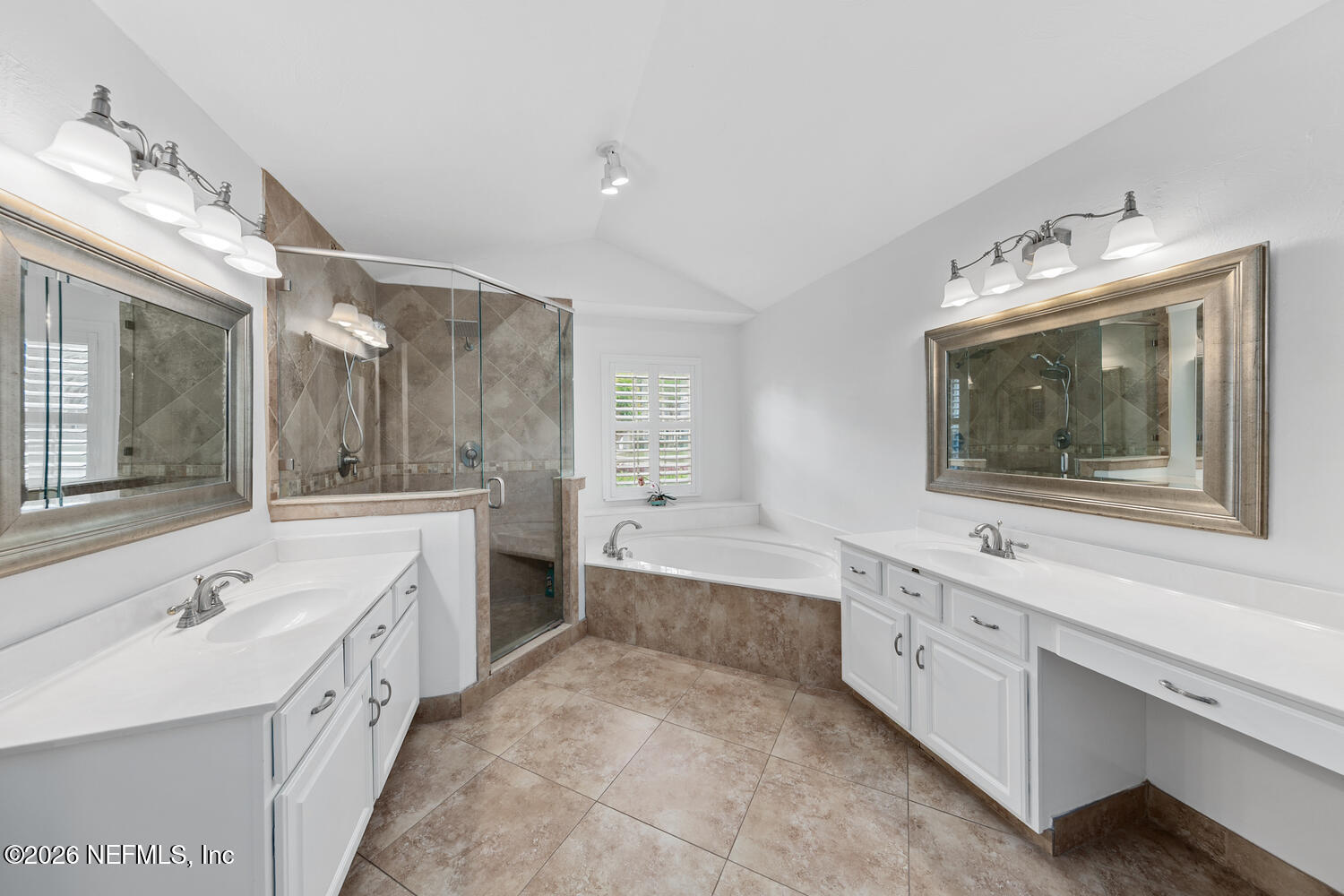 240 Shell Bluff Court Ponte Vedra Beach, FL 32082 - Photo 30 of 53 a spacious bathroom with a double vanity sink a large mirror and a bathtub