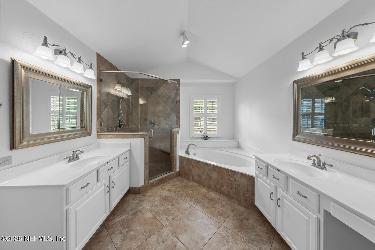 240 Shell Bluff Court Ponte Vedra Beach, FL 32082 - Photo 31 of 53 a spacious bathroom with a double vanity sink a large mirror and a bathtub