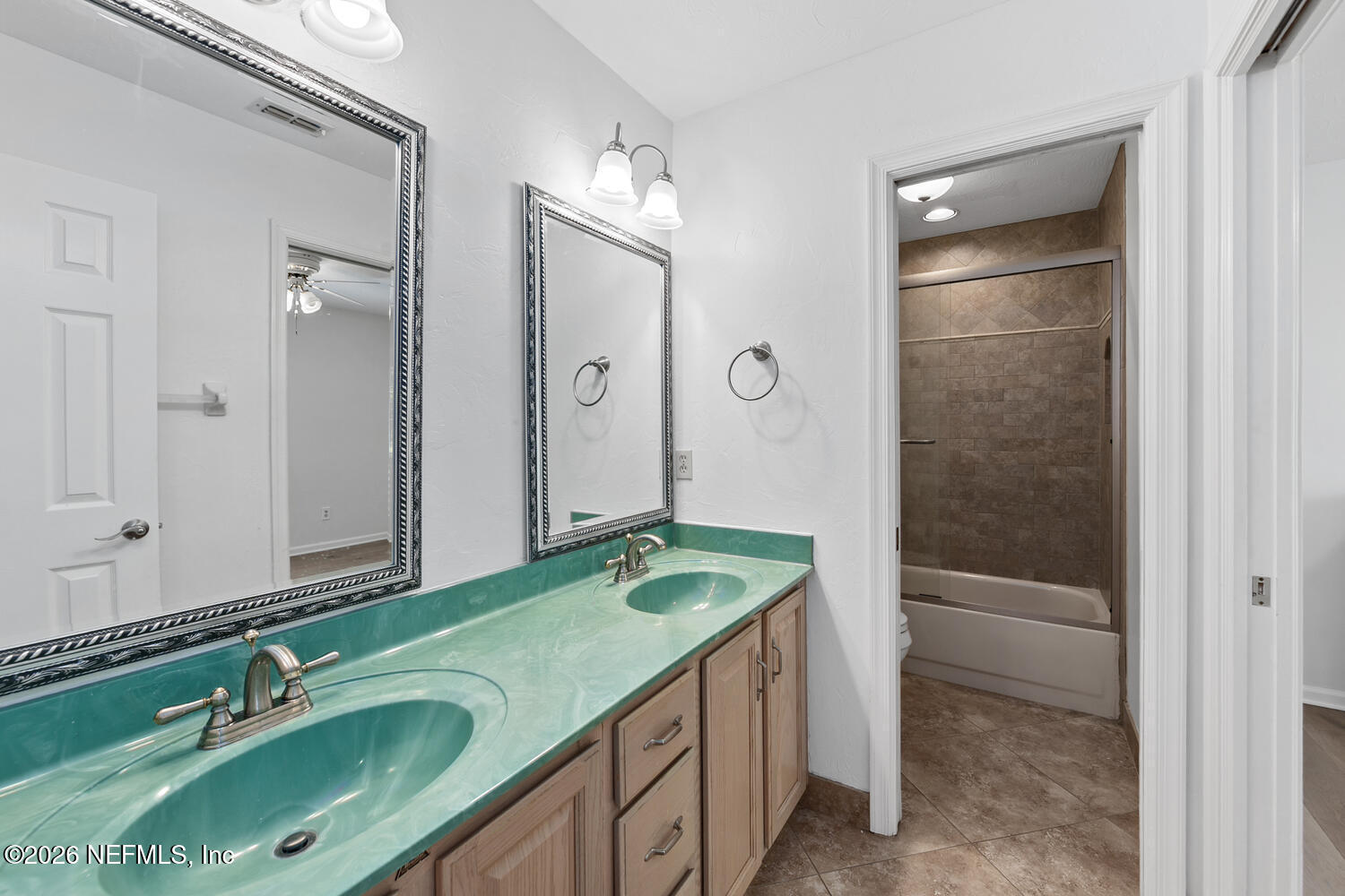 240 Shell Bluff Court Ponte Vedra Beach, FL 32082 - Photo 35 of 53 a bathroom with a granite countertop sink and a mirror