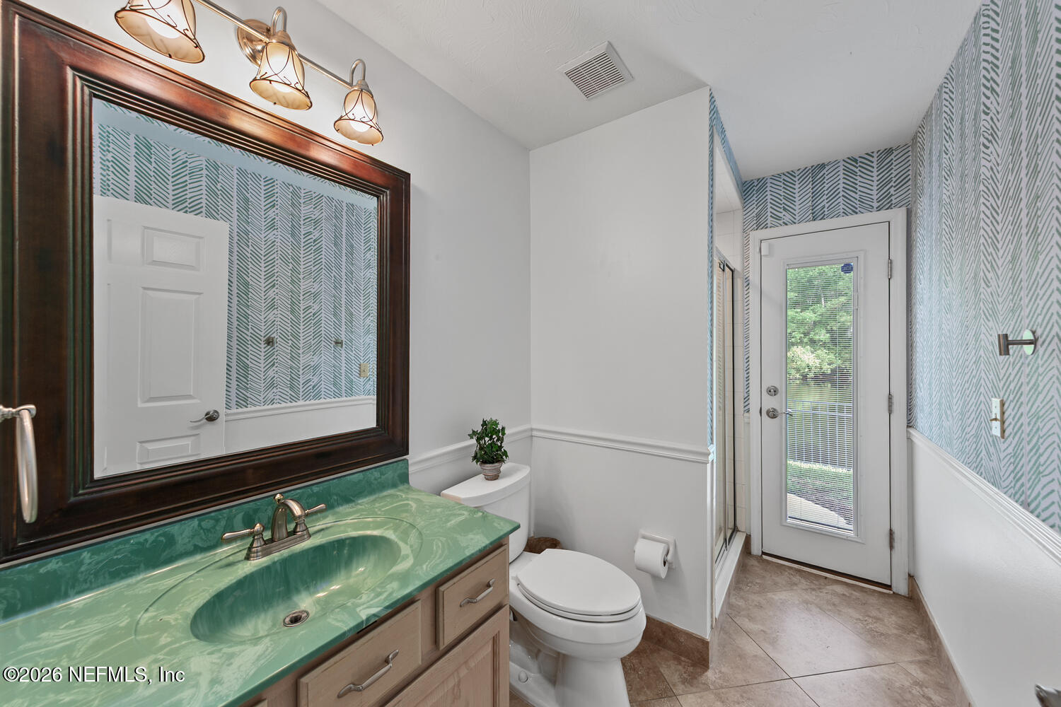 240 Shell Bluff Court Ponte Vedra Beach, FL 32082 - Photo 37 of 53 a bathroom with a granite countertop sink mirror vanity and toilet