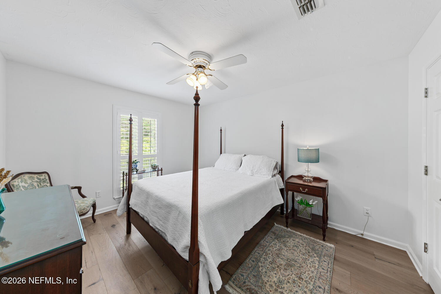 240 Shell Bluff Court Ponte Vedra Beach, FL 32082 - Photo 39 of 53 a bed room with a bed and a chandelier