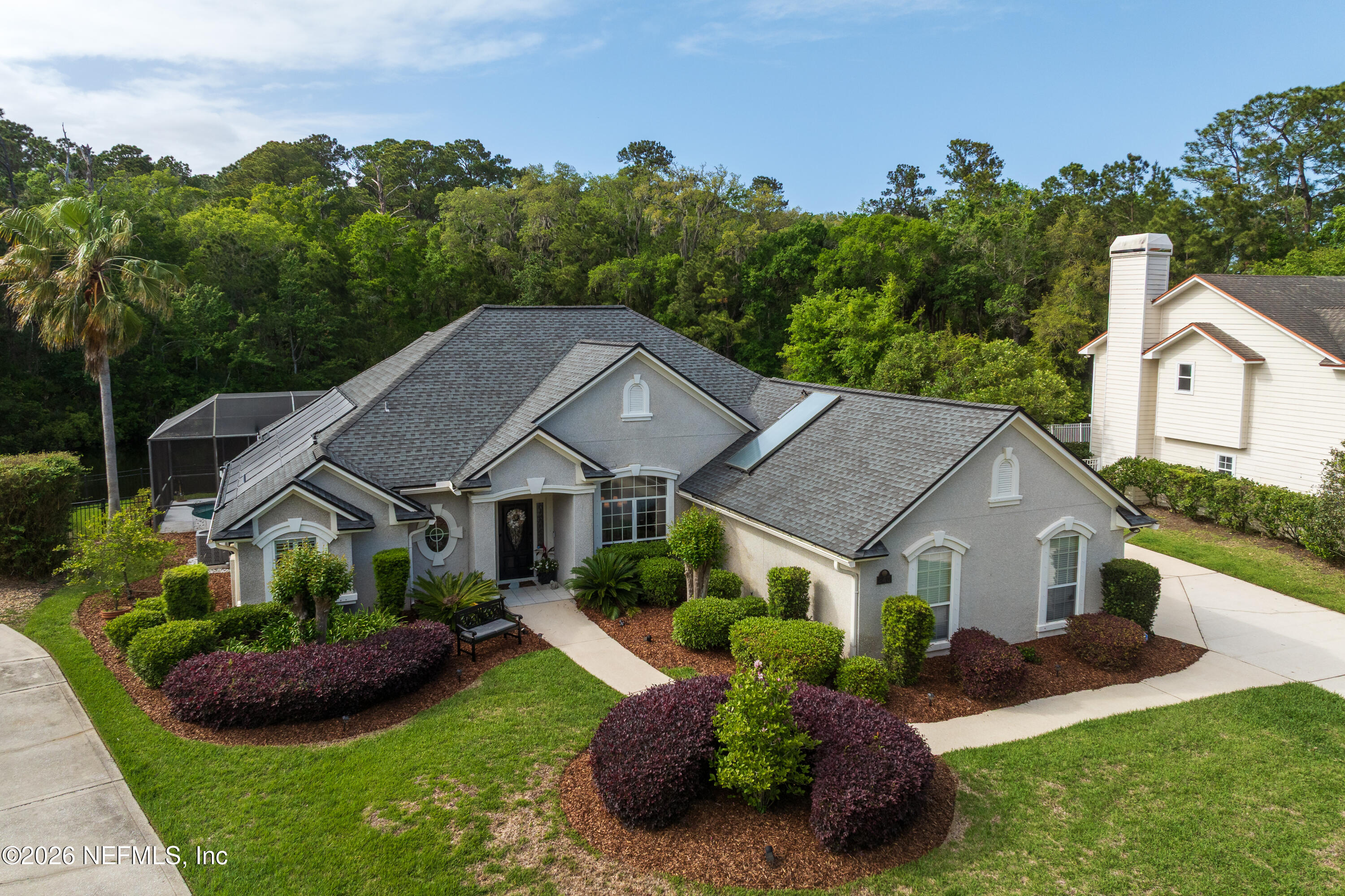240 Shell Bluff Court Ponte Vedra Beach, FL 32082 - Photo 45 of 53 a aerial view of a house with a yard and potted plants