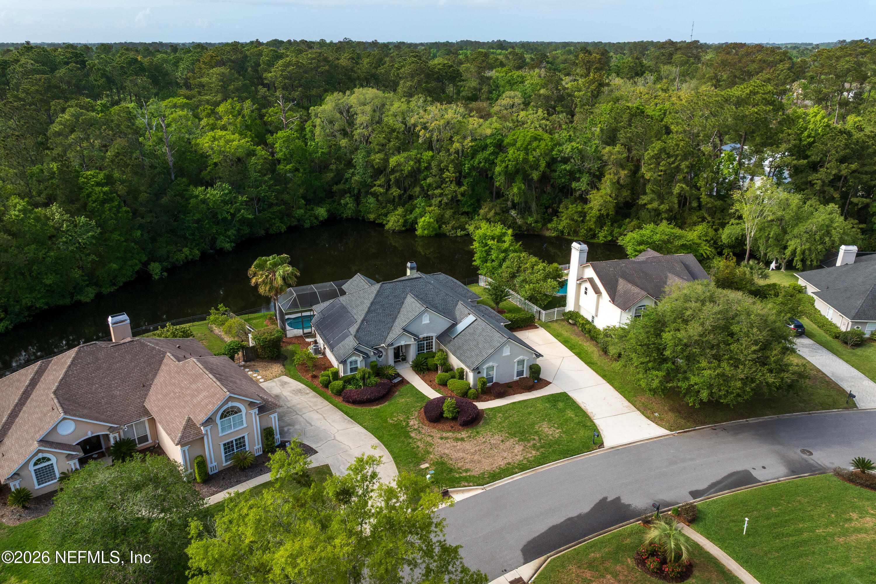 240 Shell Bluff Court Ponte Vedra Beach, FL 32082 - Photo 46 of 53 an aerial view of a house with garden space and street view