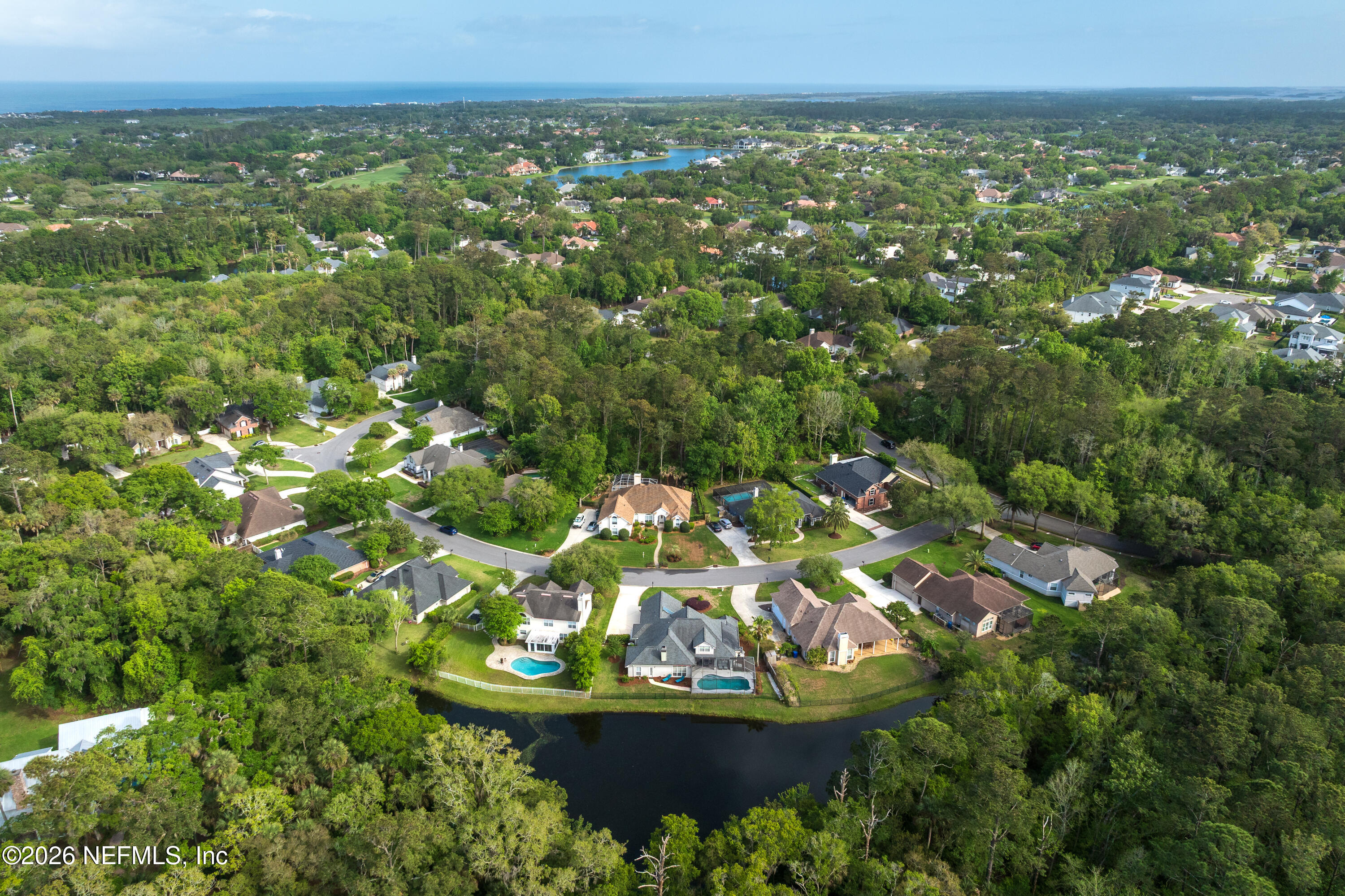 240 Shell Bluff Court Ponte Vedra Beach, FL 32082 - Photo 50 of 53 a view of a swimming pool with a yard