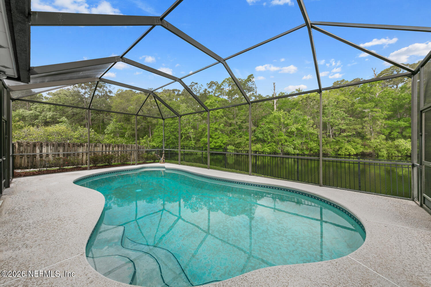 240 Shell Bluff Court Ponte Vedra Beach, FL 32082 - Photo 7 of 53 a view of a swimming pool with a yard