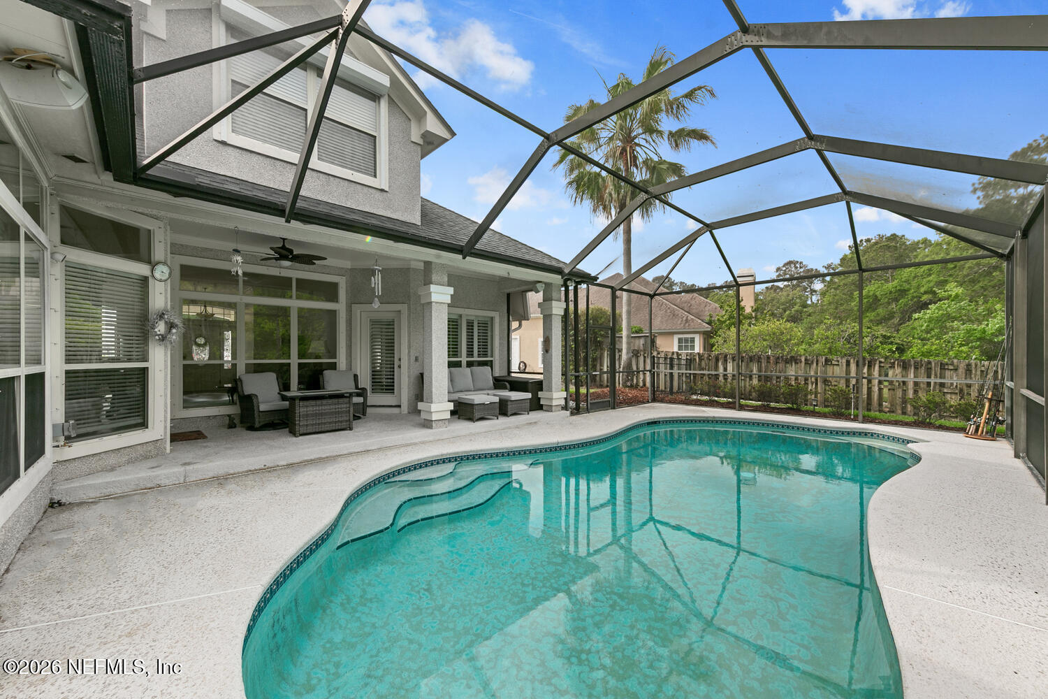 240 Shell Bluff Court Ponte Vedra Beach, FL 32082 - Photo 8 of 53 a view of a swimming pool with a patio