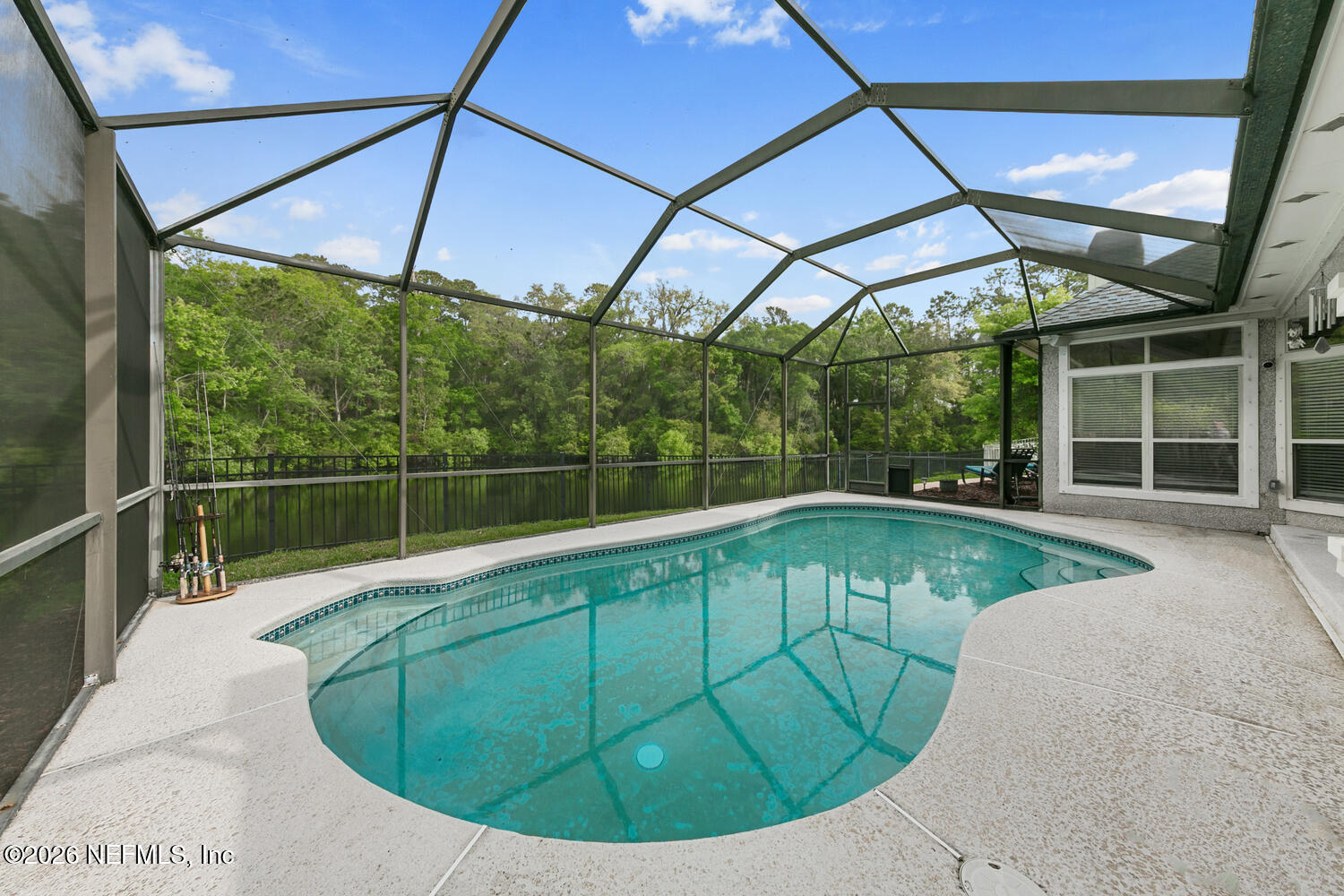 240 Shell Bluff Court Ponte Vedra Beach, FL 32082 - Photo 10 of 53 a view of a swimming pool with a porch