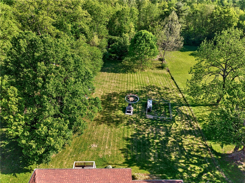 2684 Arthur Road Springfield, OH 45502 - Photo 62 of 69 This verdant outdoor space provides ample room for relaxation and recreation.