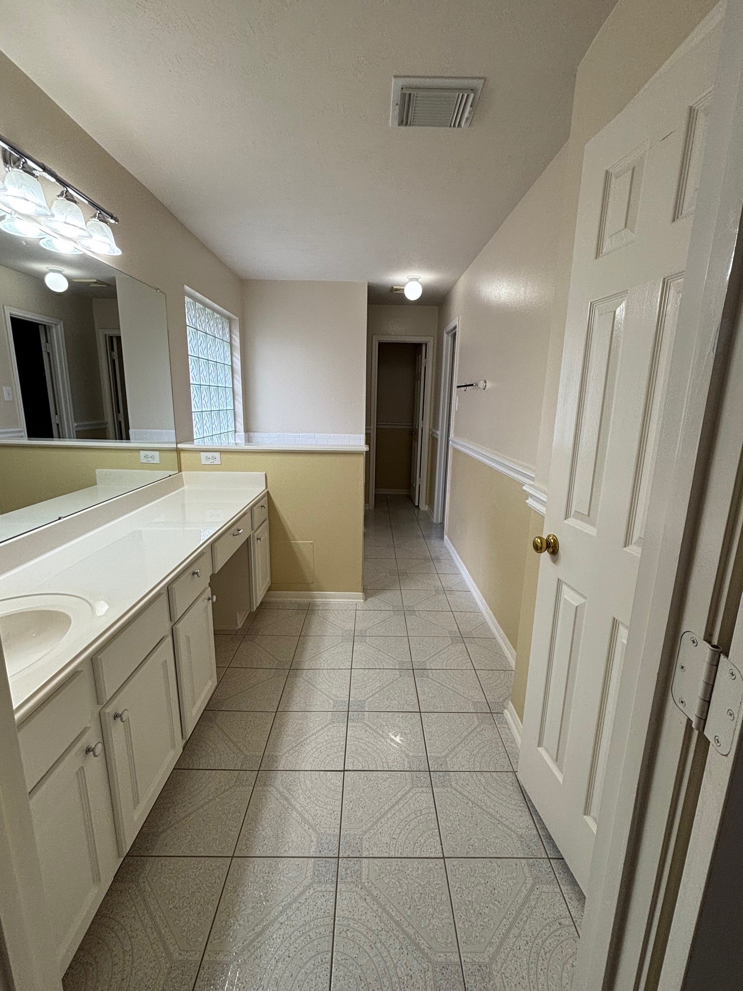 903 Christopher Baytown, TX 77521 - Photo 11 of 19 a view of a kitchen with cabinets and white appliances