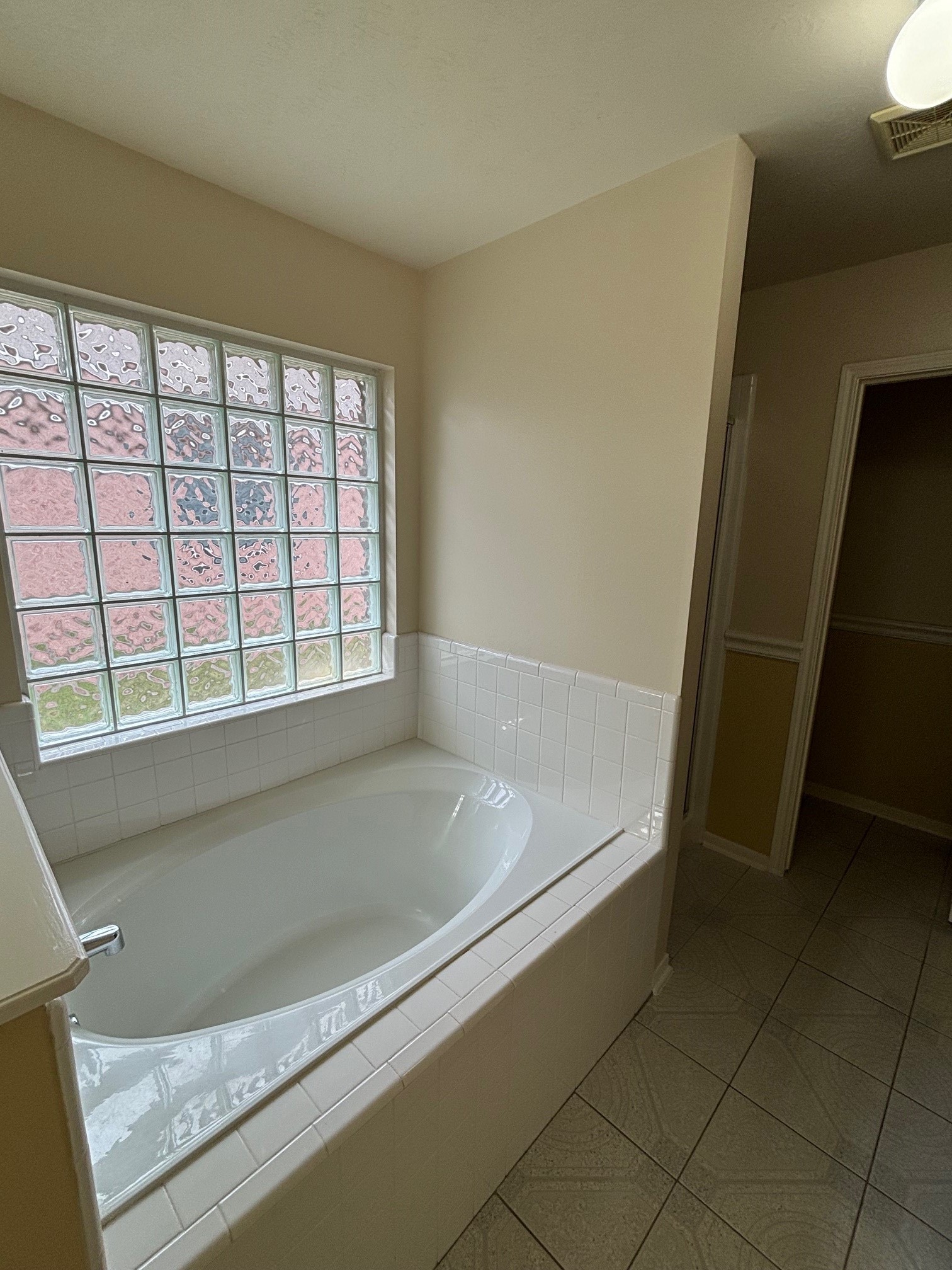 903 Christopher Baytown, TX 77521 - Photo 15 of 22 a bath tub sitting in a bathroom next to a window