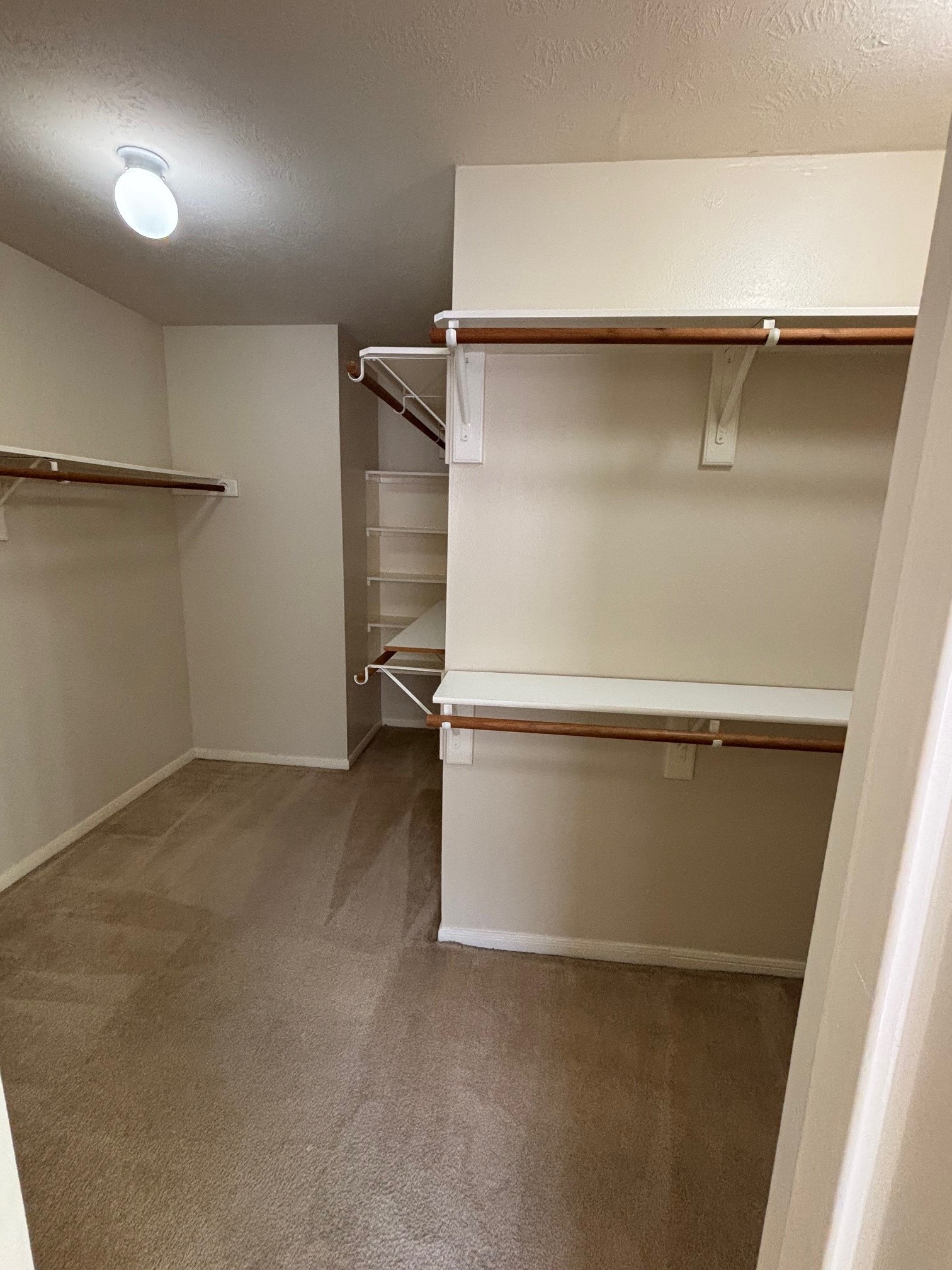 903 Christopher Baytown, TX 77521 - Photo 17 of 22 Spacious walk-in closet with ample storage.