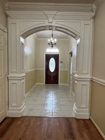 a view of a hallway with entryway