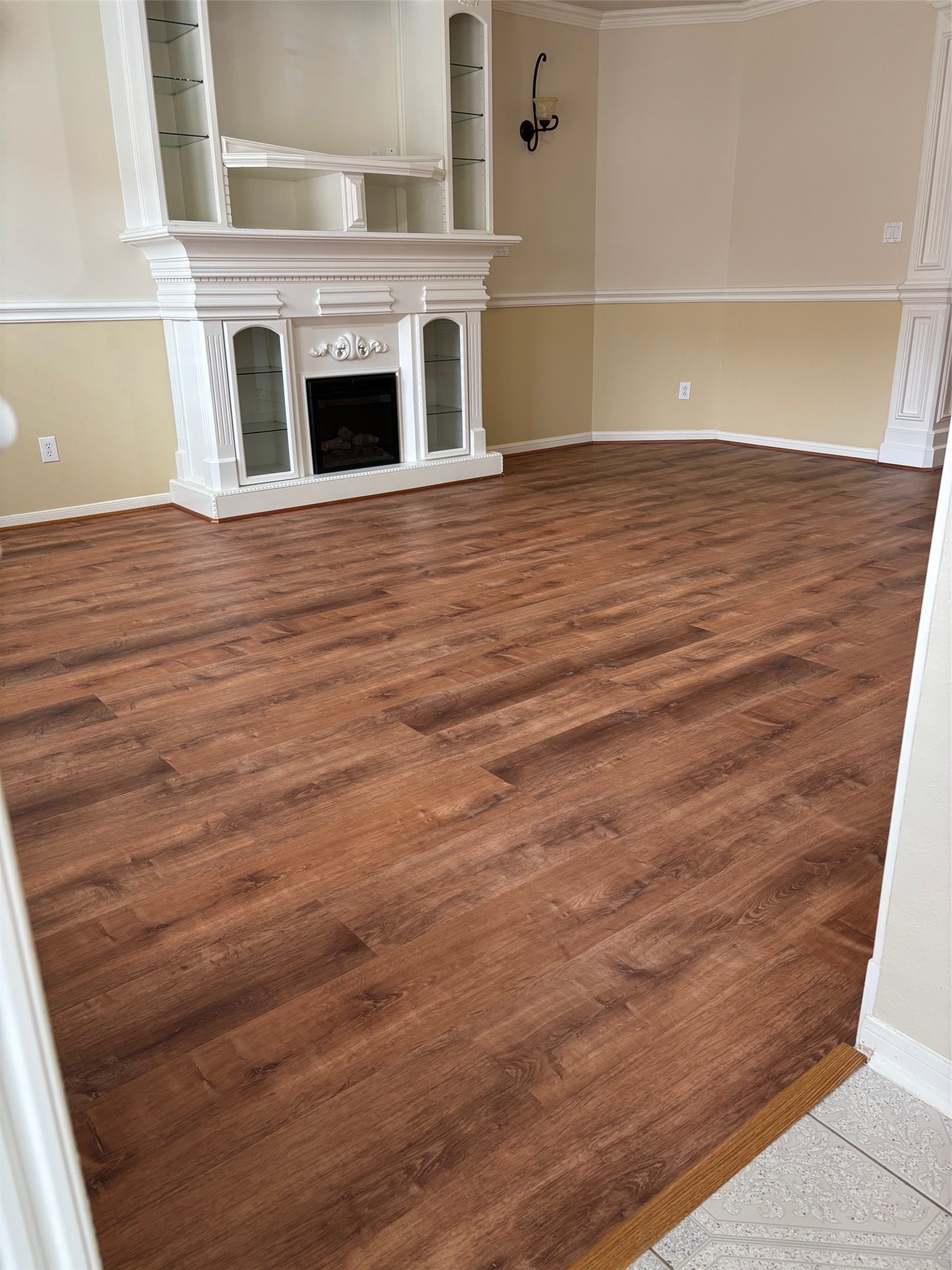 903 Christopher Baytown, TX 77521 - Photo 5 of 19 a view of a livingroom with wooden floor and a fireplace