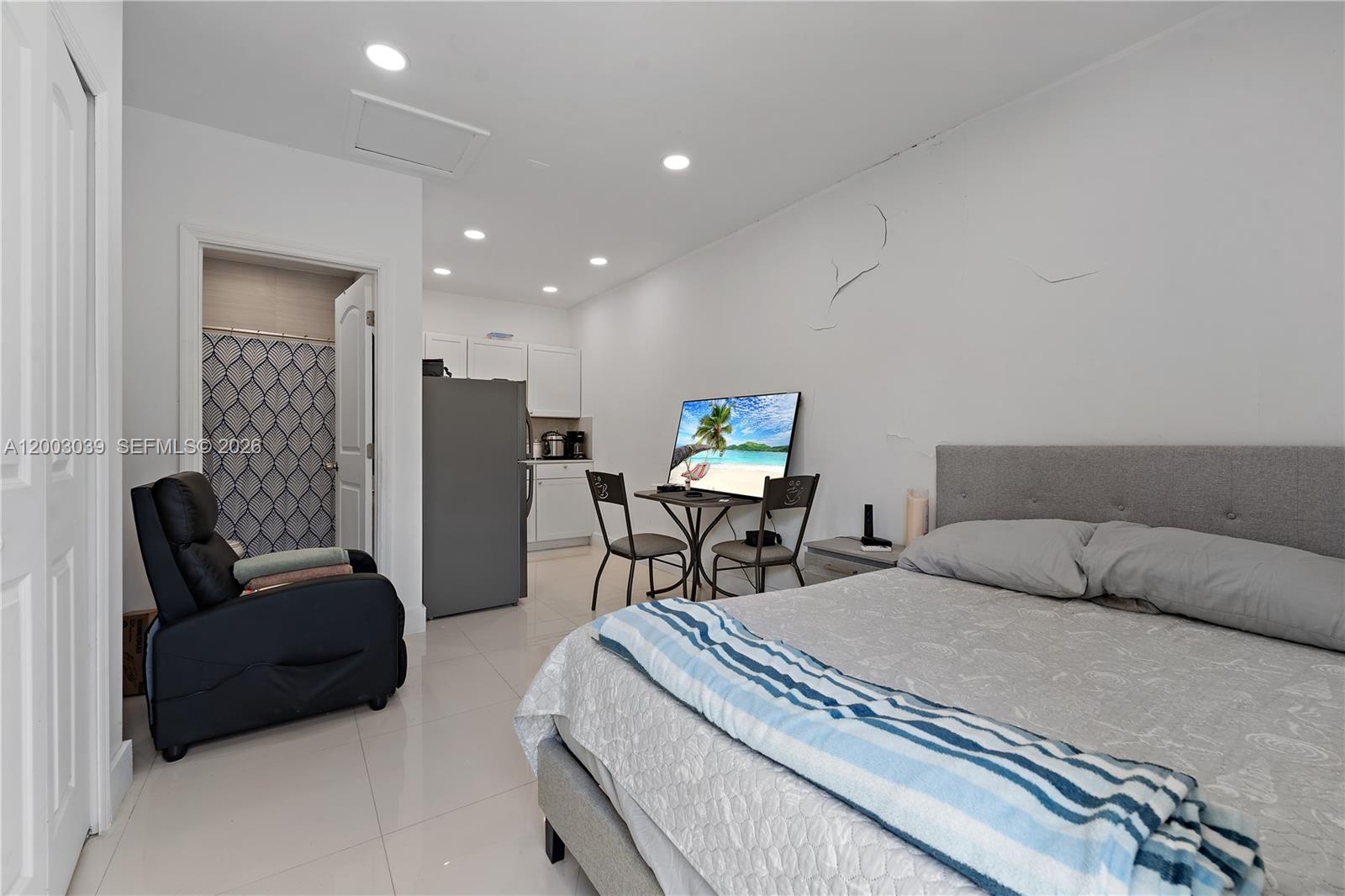 3921 Southwest 124th Court Miami, FL 33175 - Photo 15 of 22 a bedroom with a bed and a couch