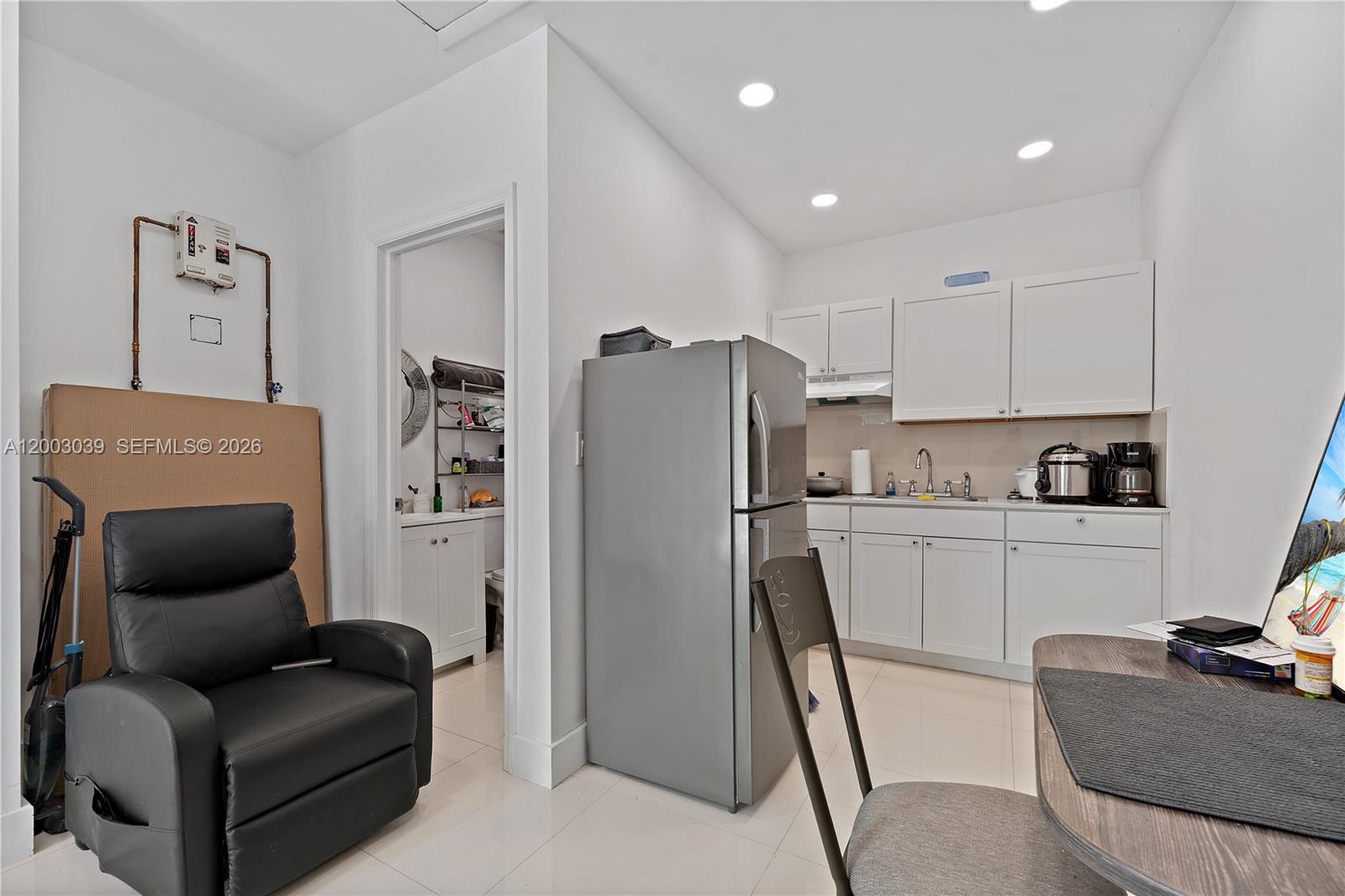 3921 Southwest 124th Court Miami, FL 33175 - Photo 16 of 22 a kitchen with stainless steel appliances granite countertop a refrigerator and a refrigerator