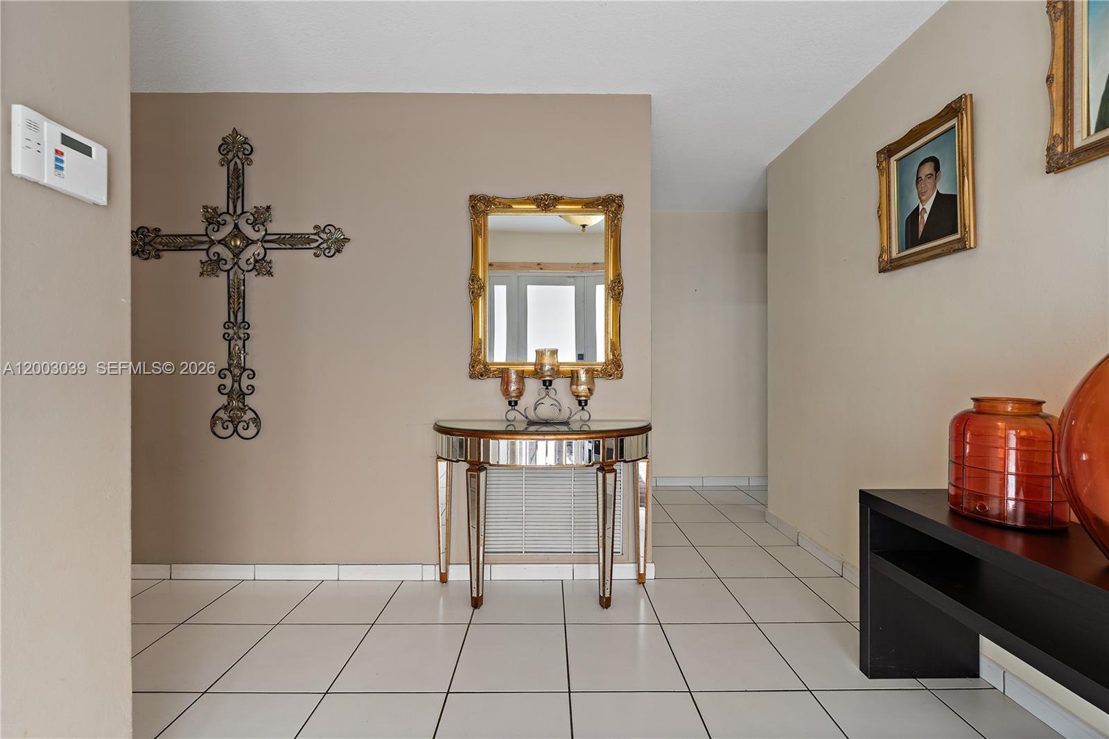 3921 Southwest 124th Court Miami, FL 33175 - Photo 7 of 22 a dining room with a table and chairs