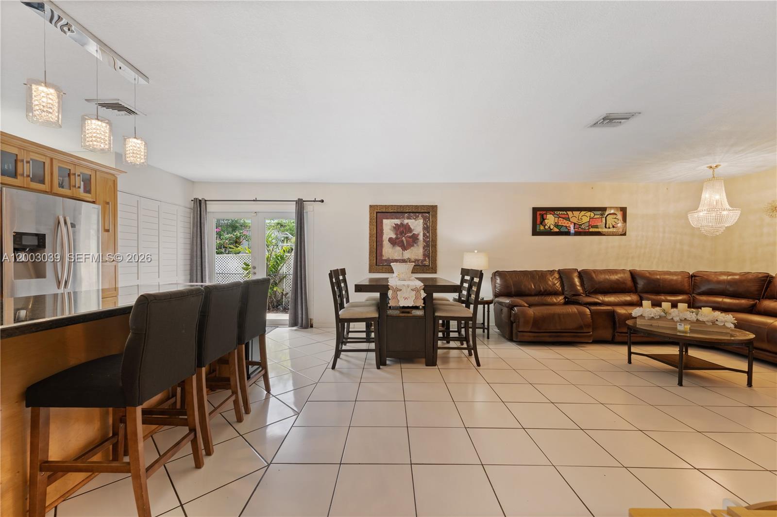 3921 Southwest 124th Court Miami, FL 33175 - Photo 8 of 22 a living room with furniture and a table