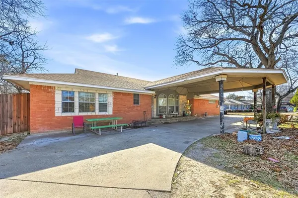 a backyard of a house with yard fire pit and outdoor space