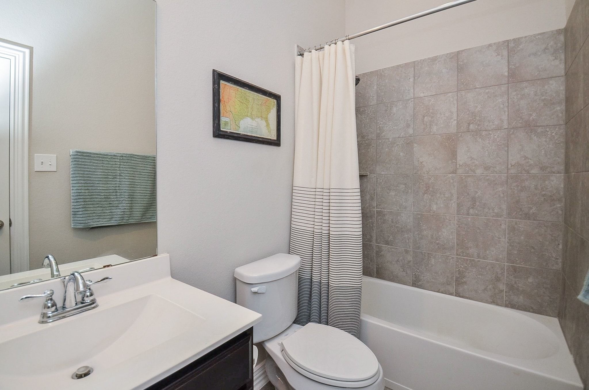 2714 Topaz Cove Lane Rosharon, TX 77583 - Photo 13 of 50 a bathroom with a sink toilet and shower