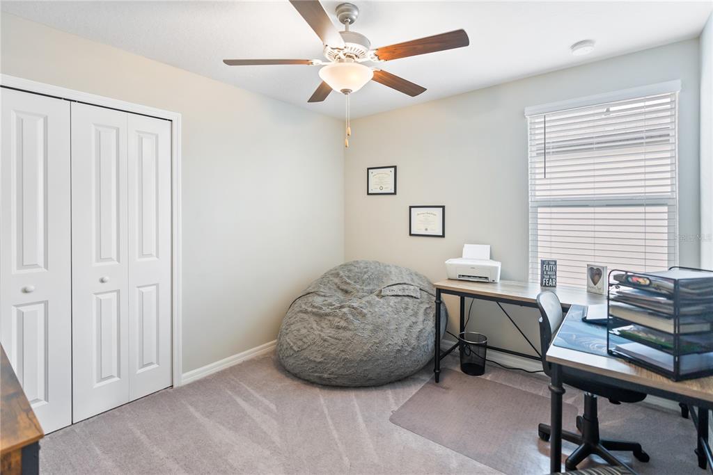 9313 Lemon Drop Loop Ruskin, FL 33573 - Photo 22 of 29 a workspace with a window