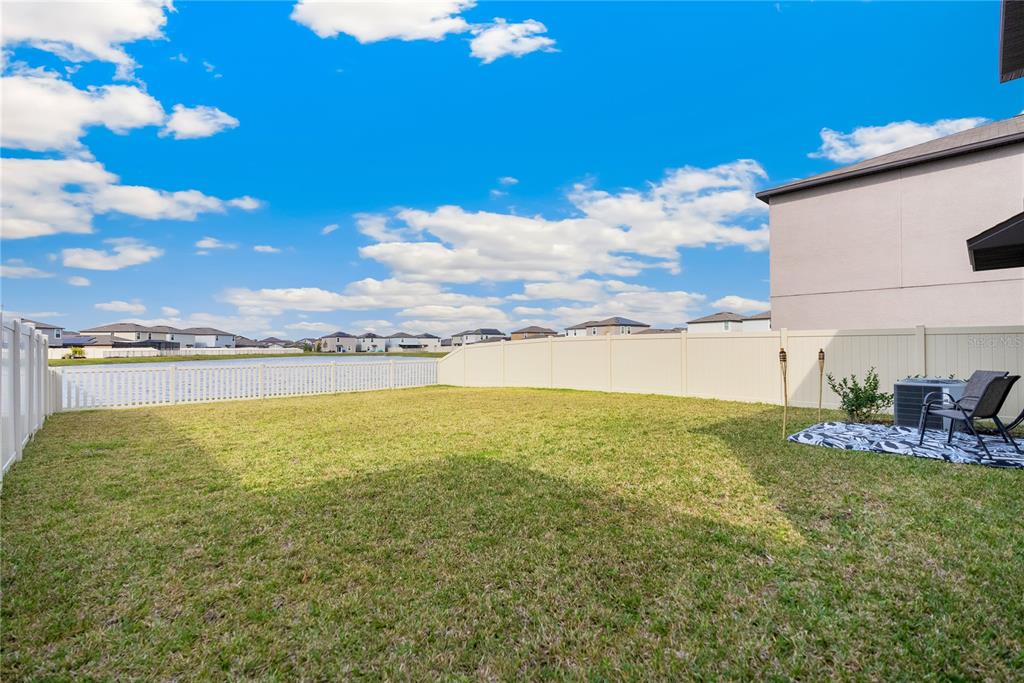 9313 Lemon Drop Loop Ruskin, FL 33573 - Photo 25 of 29 a view of an ocean and beach
