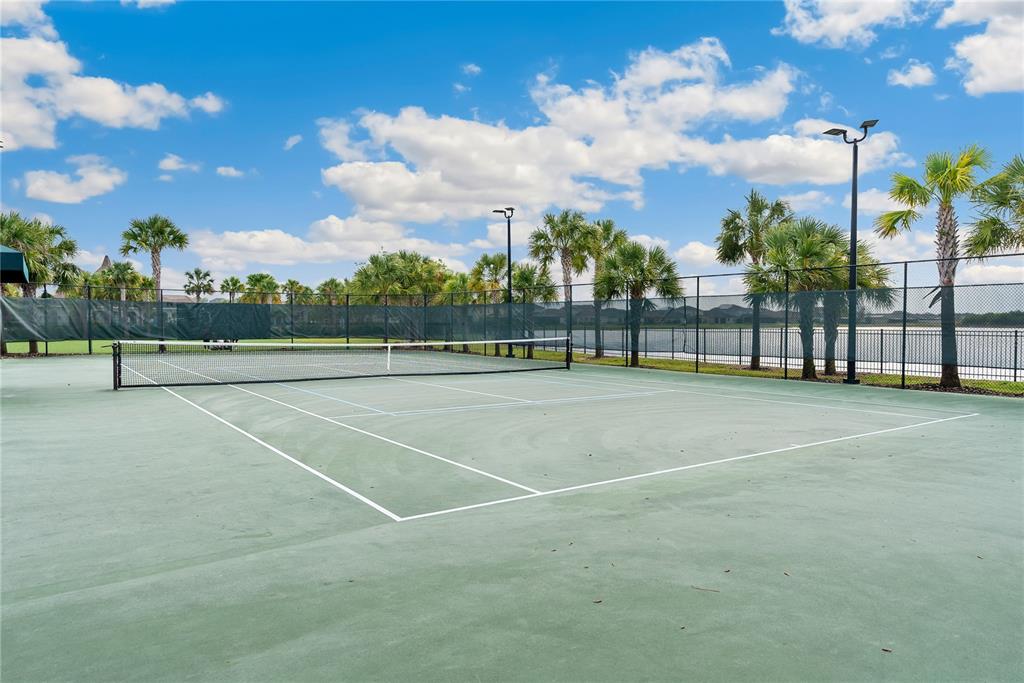 9313 Lemon Drop Loop Ruskin, FL 33573 - Photo 27 of 29 a view of tennis court