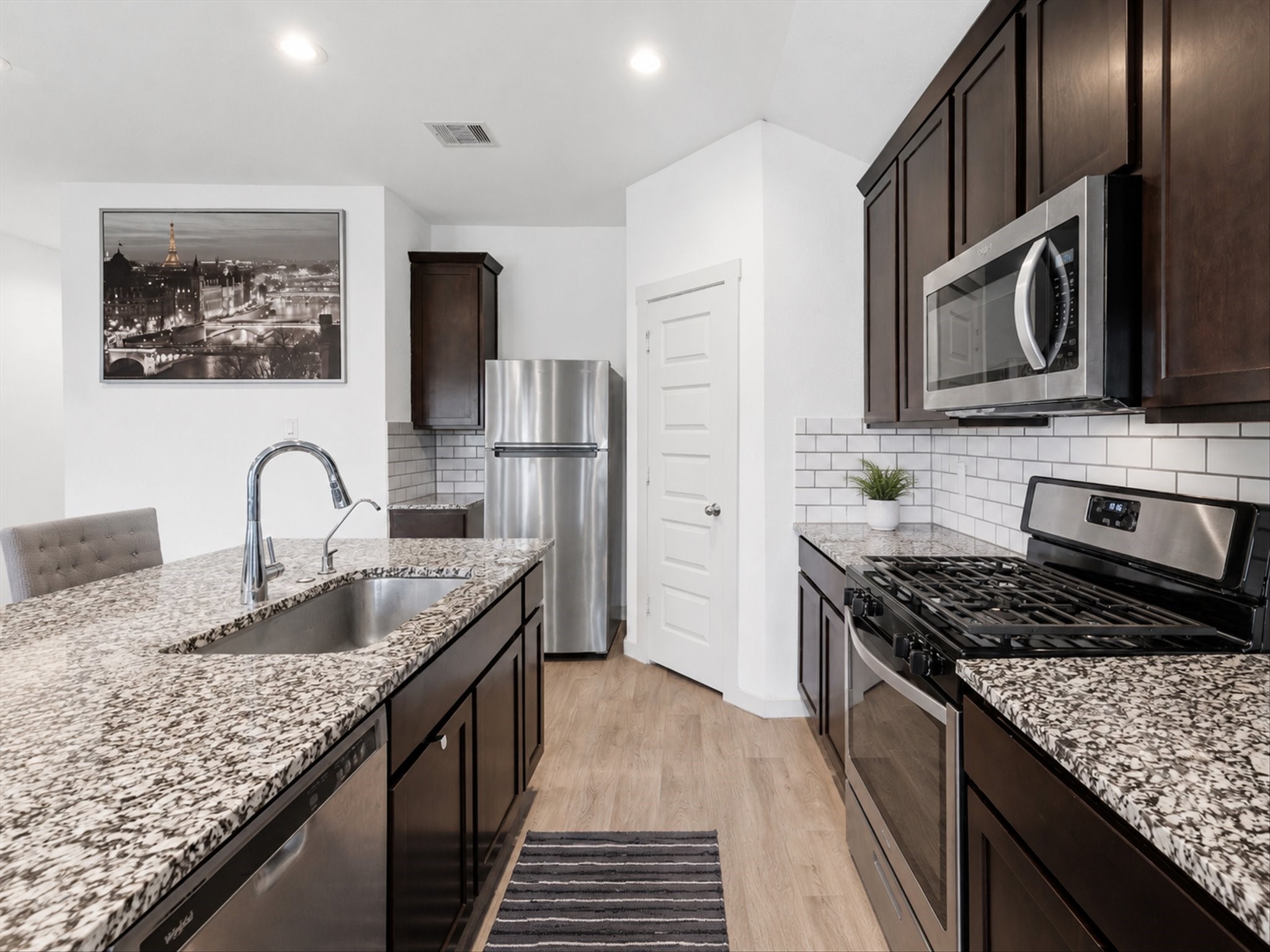 8219 Precious Passing Way Rosharon, TX 77583 - Photo 9 of 24 Kitchen with stainless steel appliances